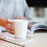 Transparent Product Amazon Product Photography china The woman is reading a book with a cup.