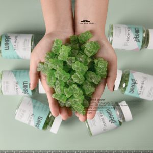 Product Photography in China Vitamin green bear lifestyle, who is holding it?