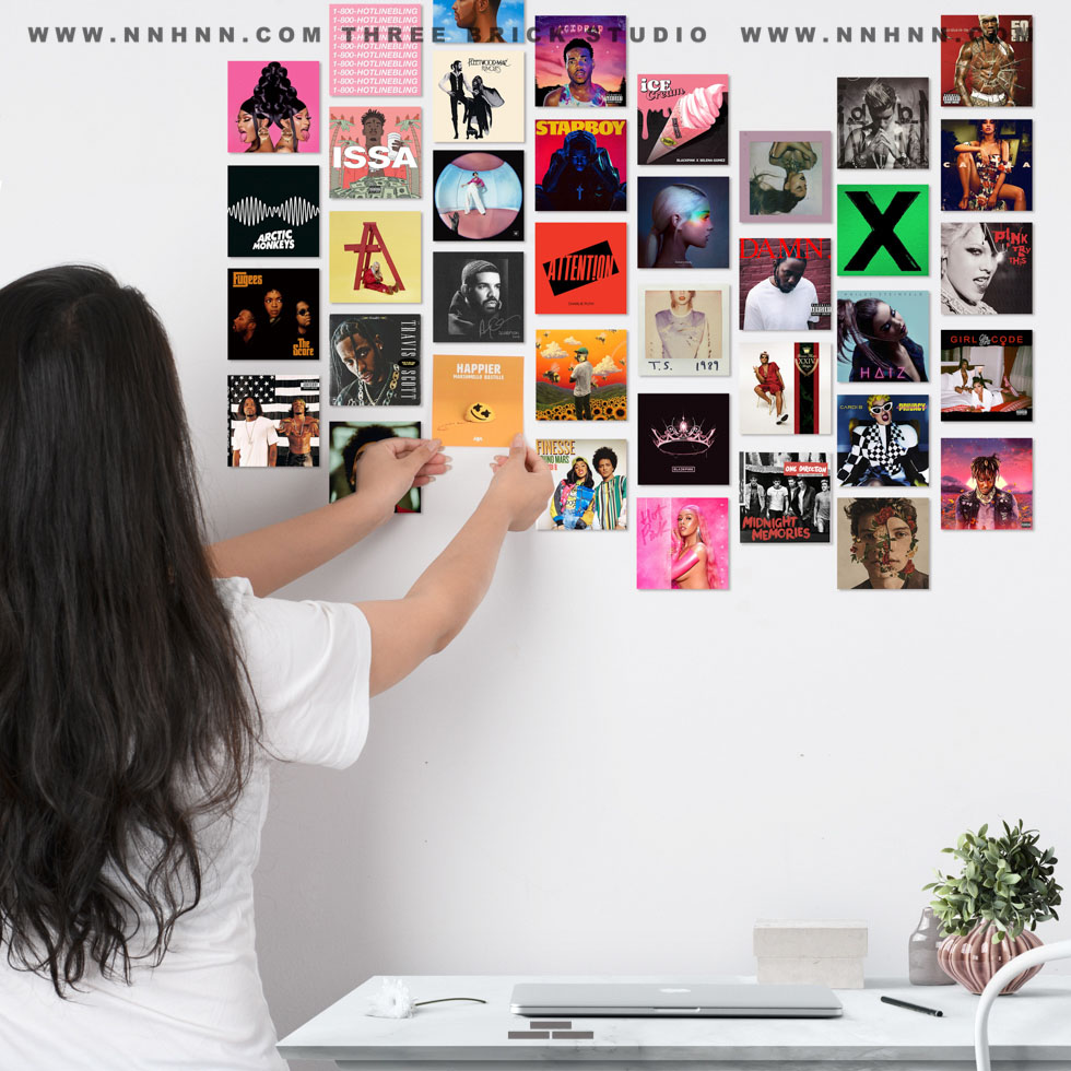 The best product photography shows Chinese girls putting posters on the wall.