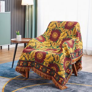 The best furniture photography is in China. The blanket is on the chair.