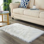 The best furniture photography is in China. White blanket on the floor.