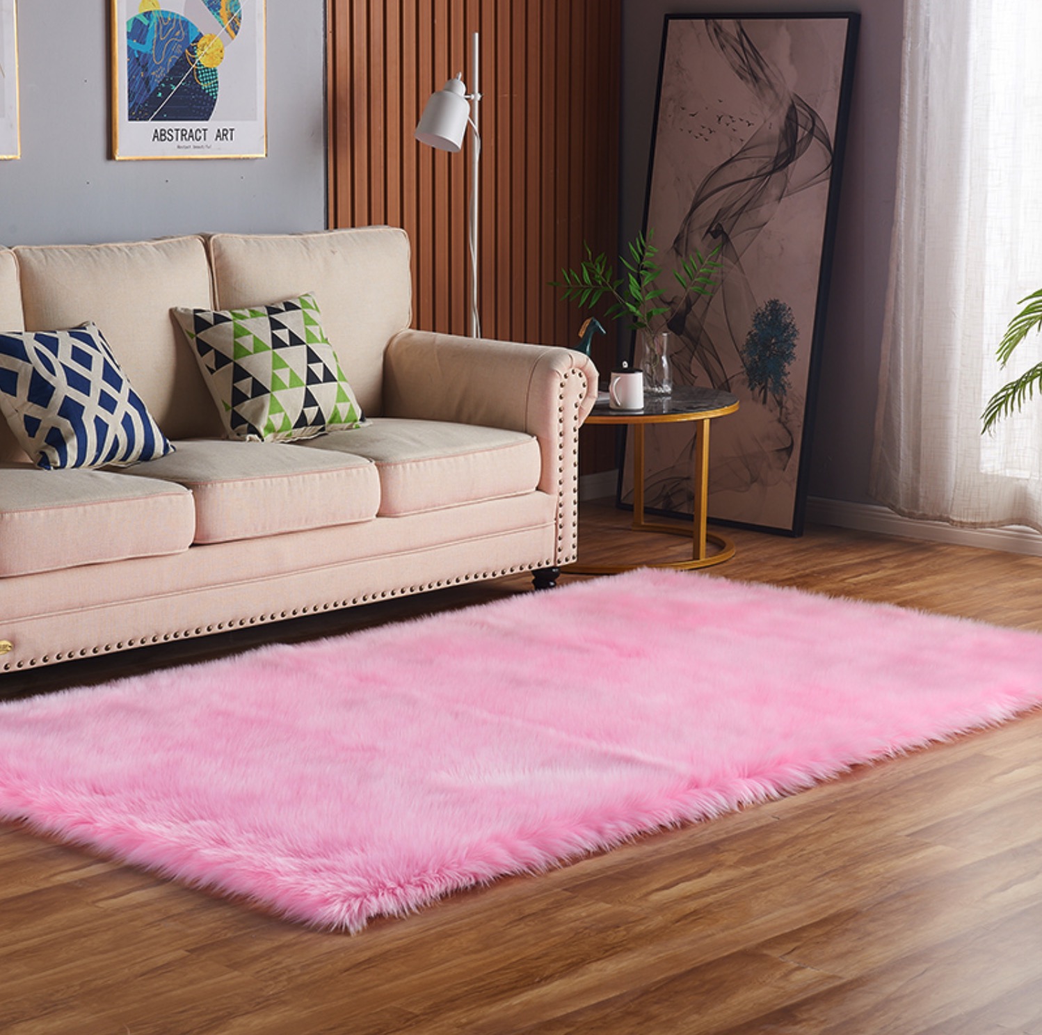 The best furniture photography is in China. The pink blanket is on the floor