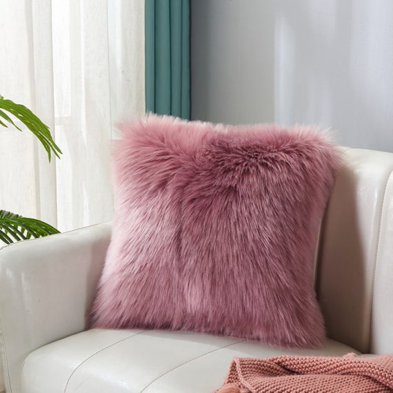 The best furniture photography is in China. Pink pillow